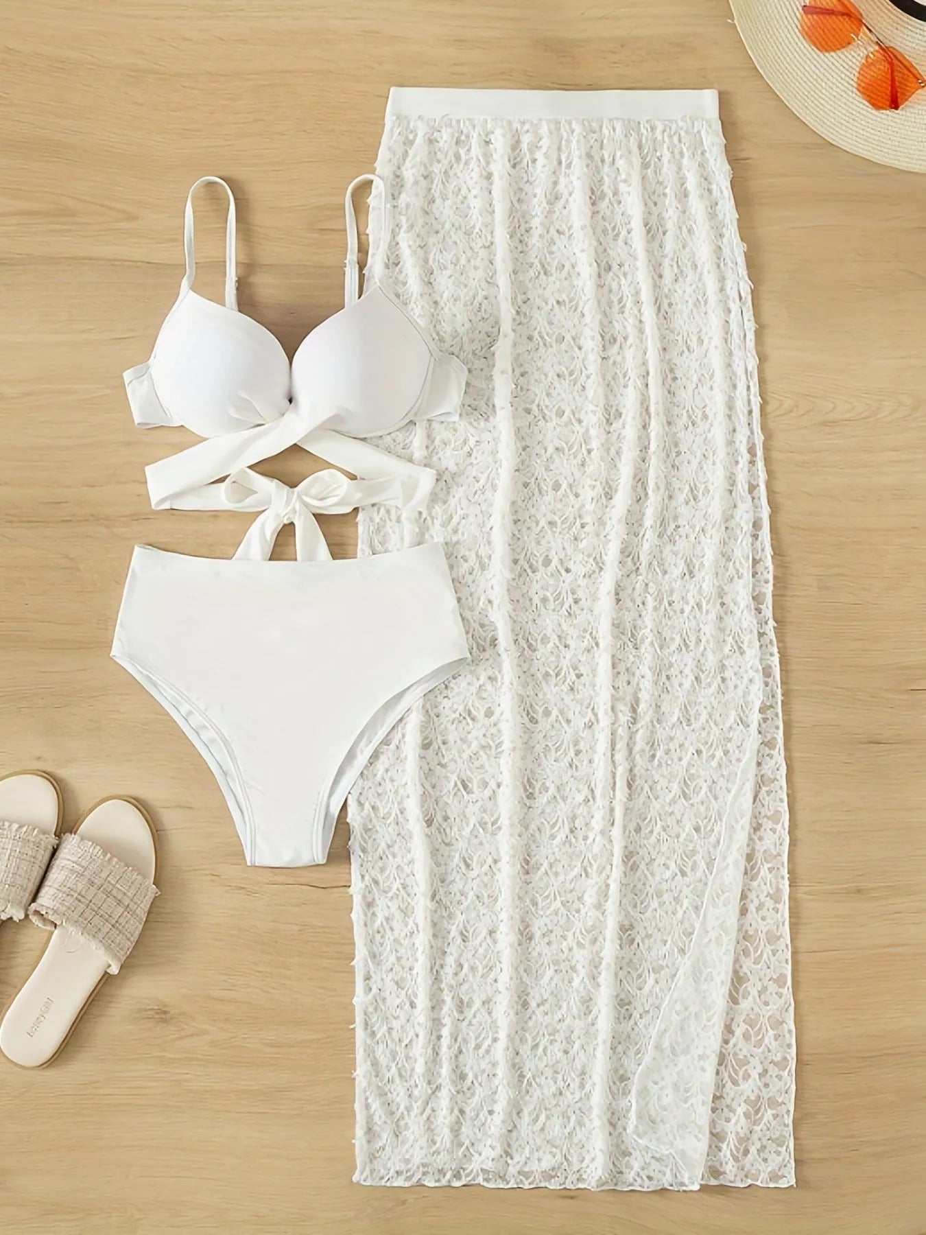 White three-piece swimsuit set with sleeveless top, briefs, and gathered long skirt for swimming sports