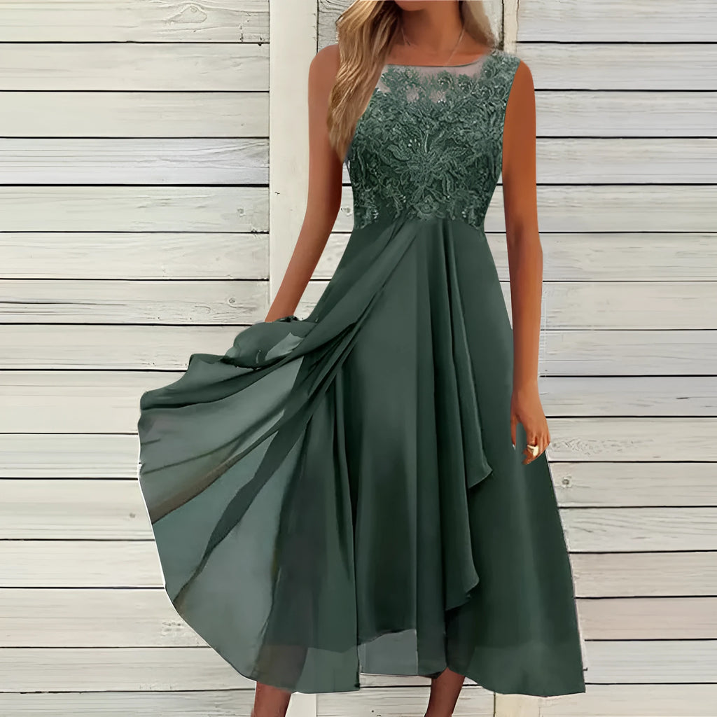 Women's sleeveless green chiffon dress with hollow-out lace detail, mid-length skirt.