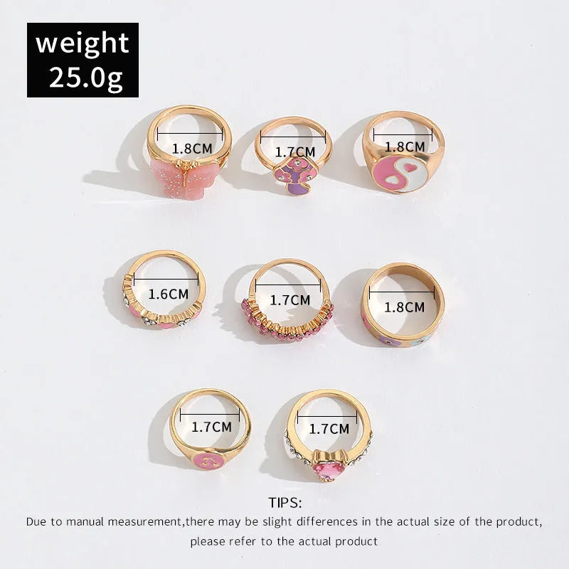 Set of 8 zinc alloy colour dripping rings with plant and flower motifs in European style