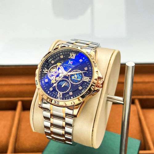Automatic mechanical men's wristwatch with rose gold case and black dial on a strap.