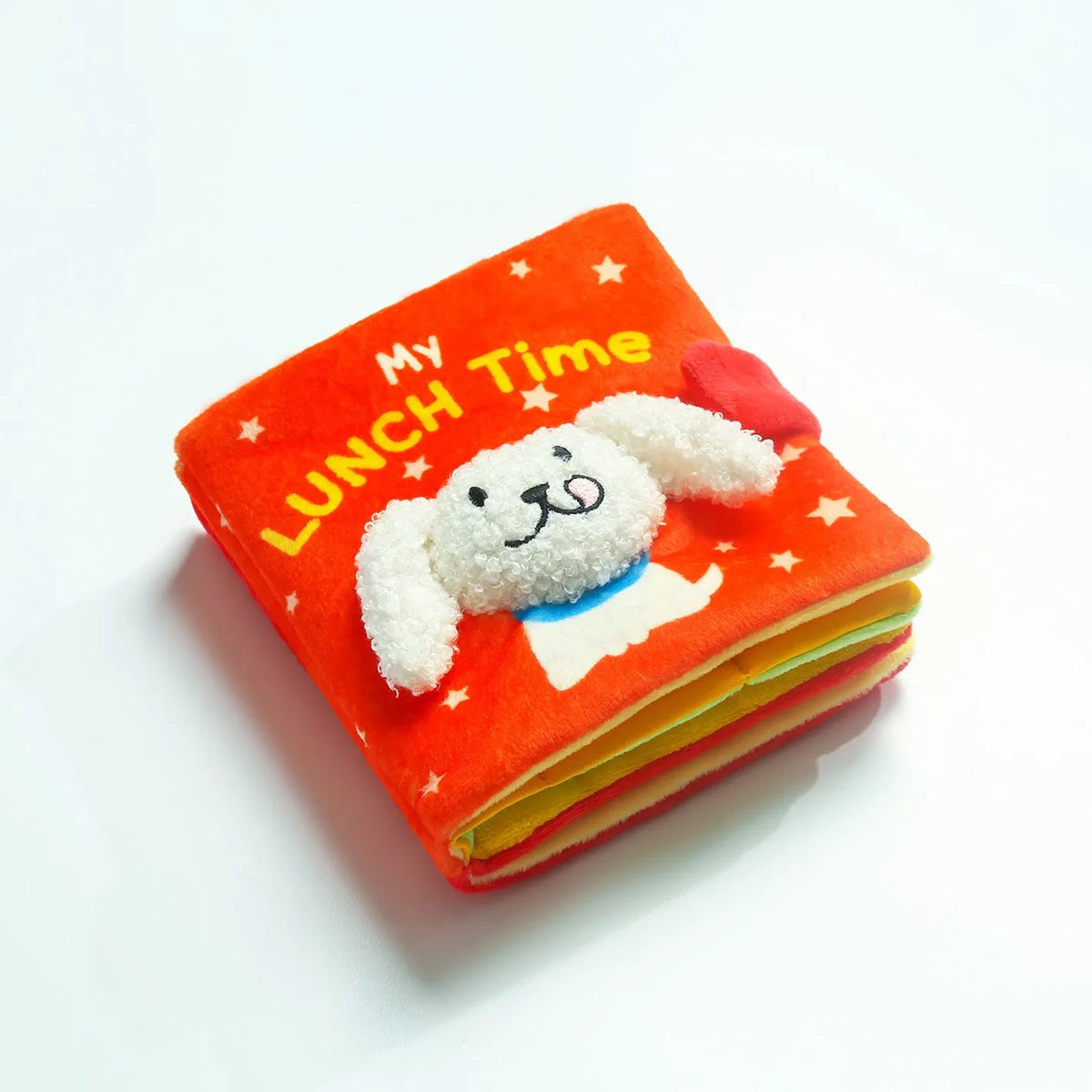 Red book plush pet toy for food searching and interactive enrichment featuring soft fabric