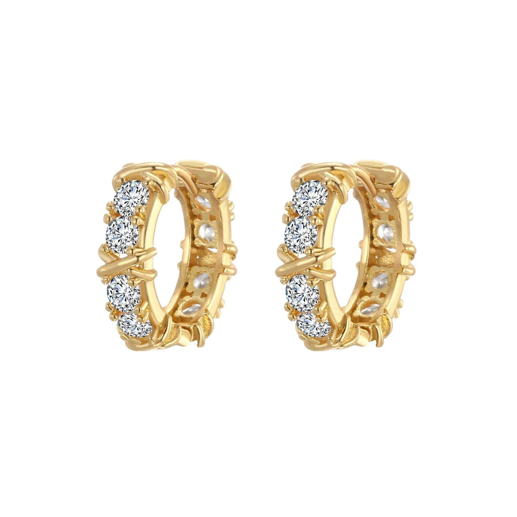 A pair of geometric hexagonal clover cross earrings with an elliptical shape in a gold or silver electroplated finish.