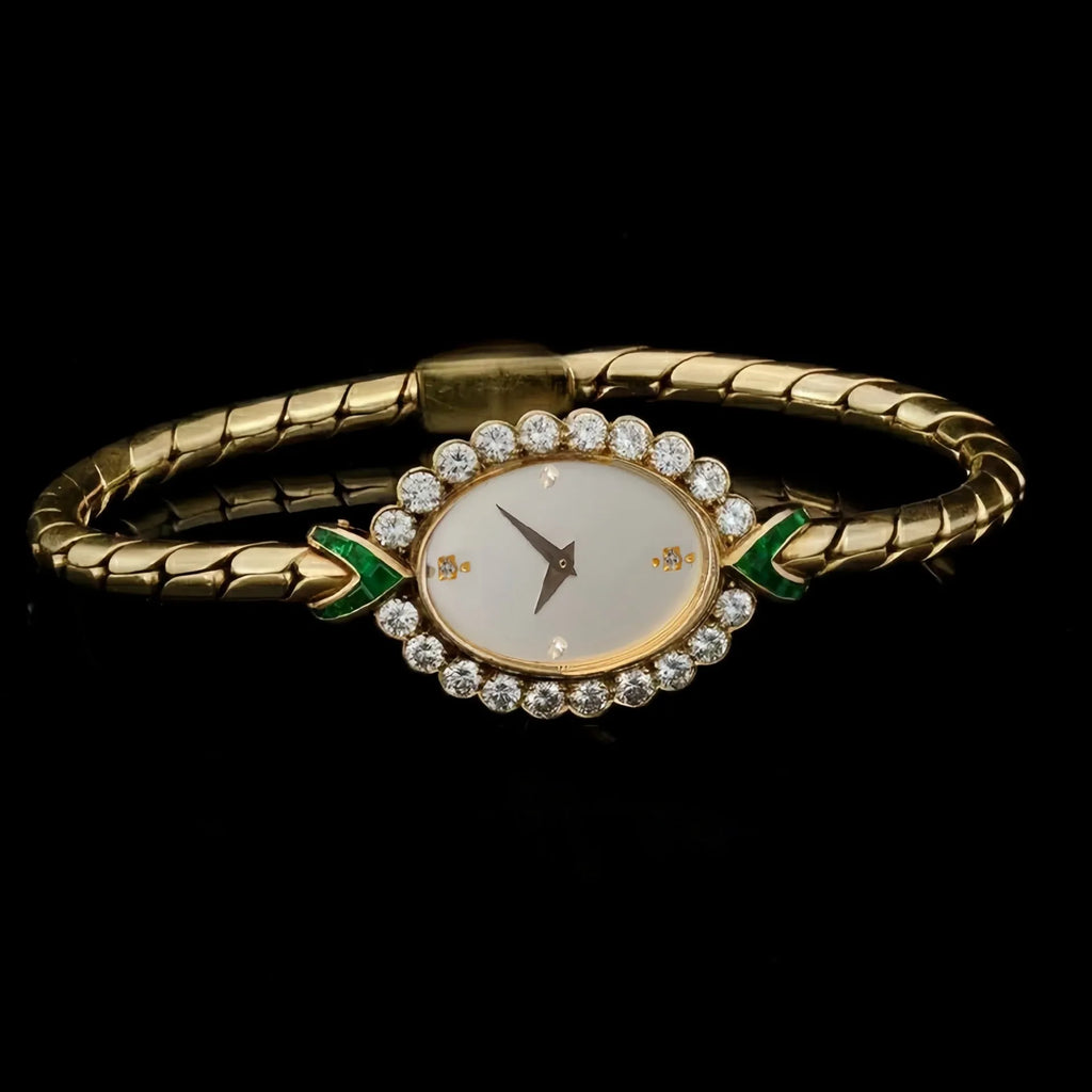 European small gold women's watch with handmade rhinestone inlay and adjustable strap on light background