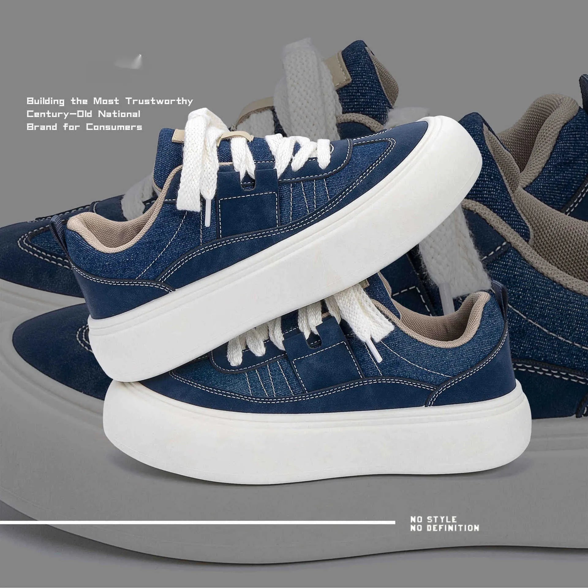 Men's black canvas platform sneakers with round toe and lace-up front on grey background