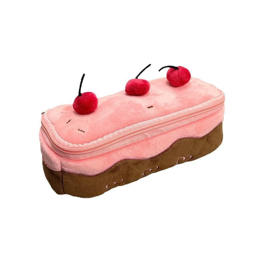 Cherry Cake plush velvet pencil bag with zip closure on a table.
