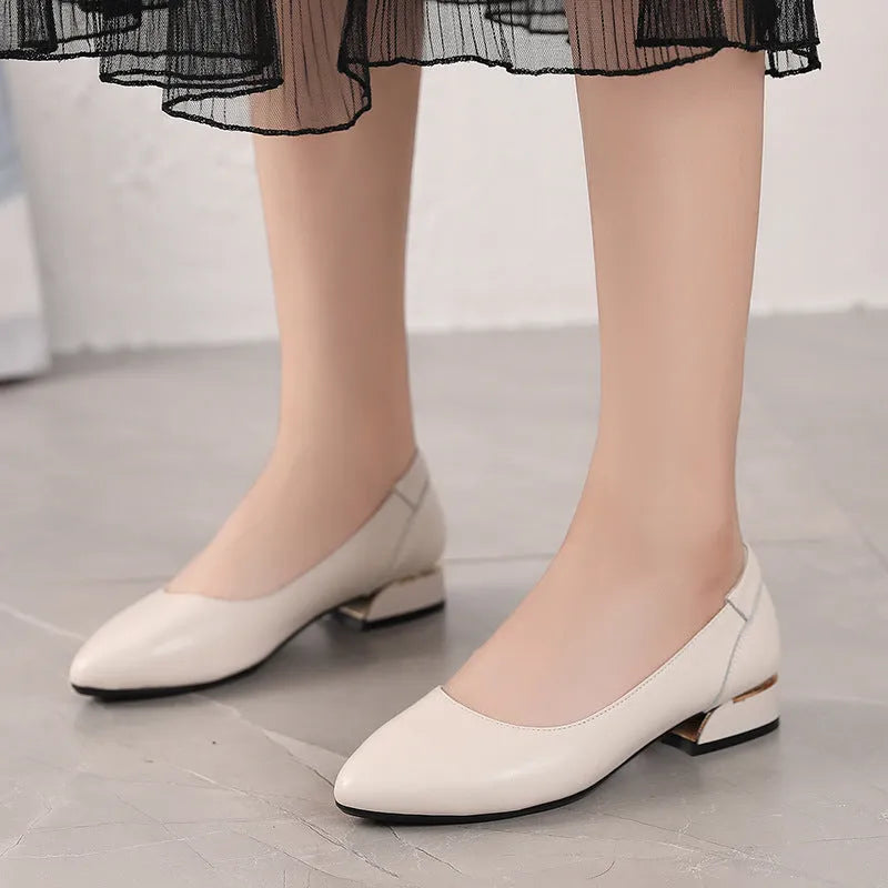 Women's beige cowhide casual shoes with flat heels, pointed toes, and buckle fastening