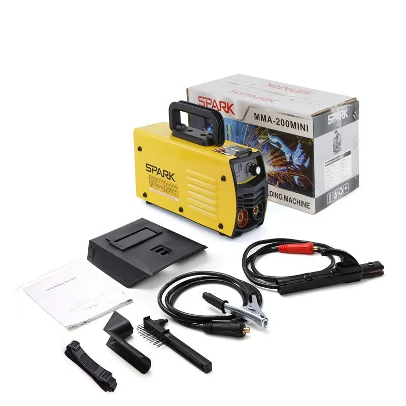 Household MMA-200MIN 220V DC inverter welding machine with cables, tongs, clamp, and face shield on a workbench.
