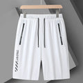 Men's black loose-fit quick-dry nylon sports shorts on a grey background.