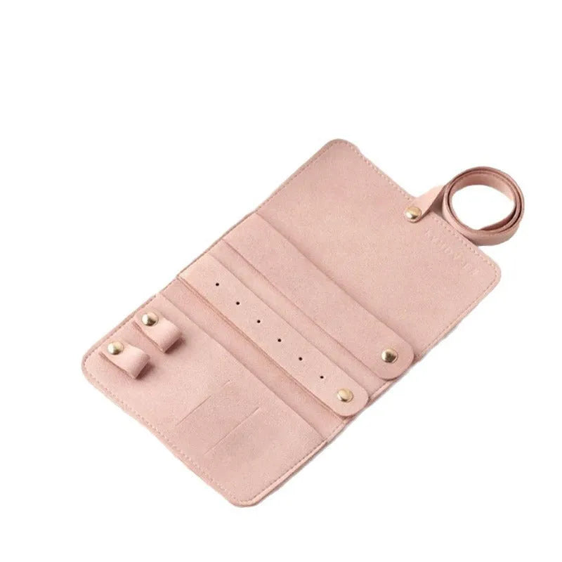 Brown PU leather and microfiber jewellery storage bag for earrings, rings and watches.
