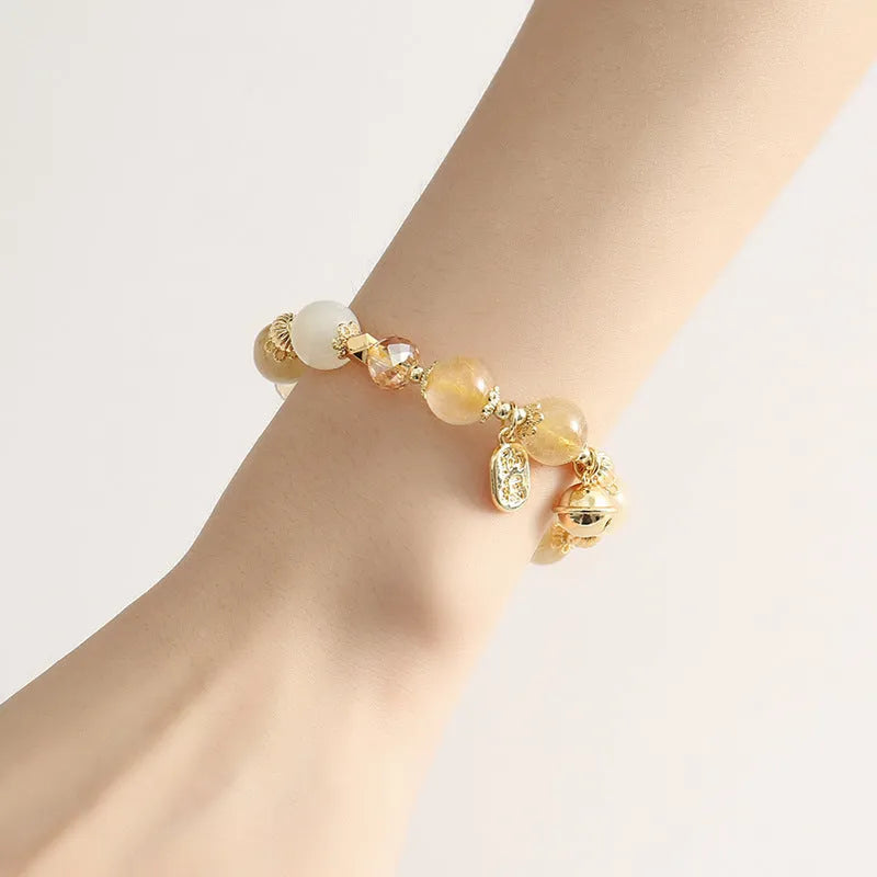 Korean style gold crystal bracelet with rutilated quartz stones and electroplated finish.