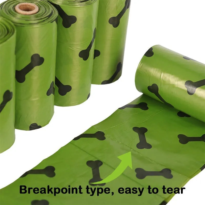 Roll of military green degradable dog poop bags with black bone print, showing bag size of 23x33cm.
