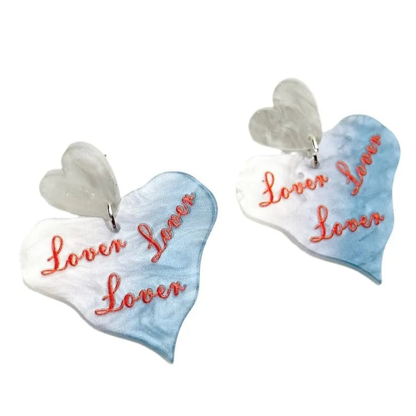 Color printing love heart acrylic earrings in six sweet styles A-F on white background