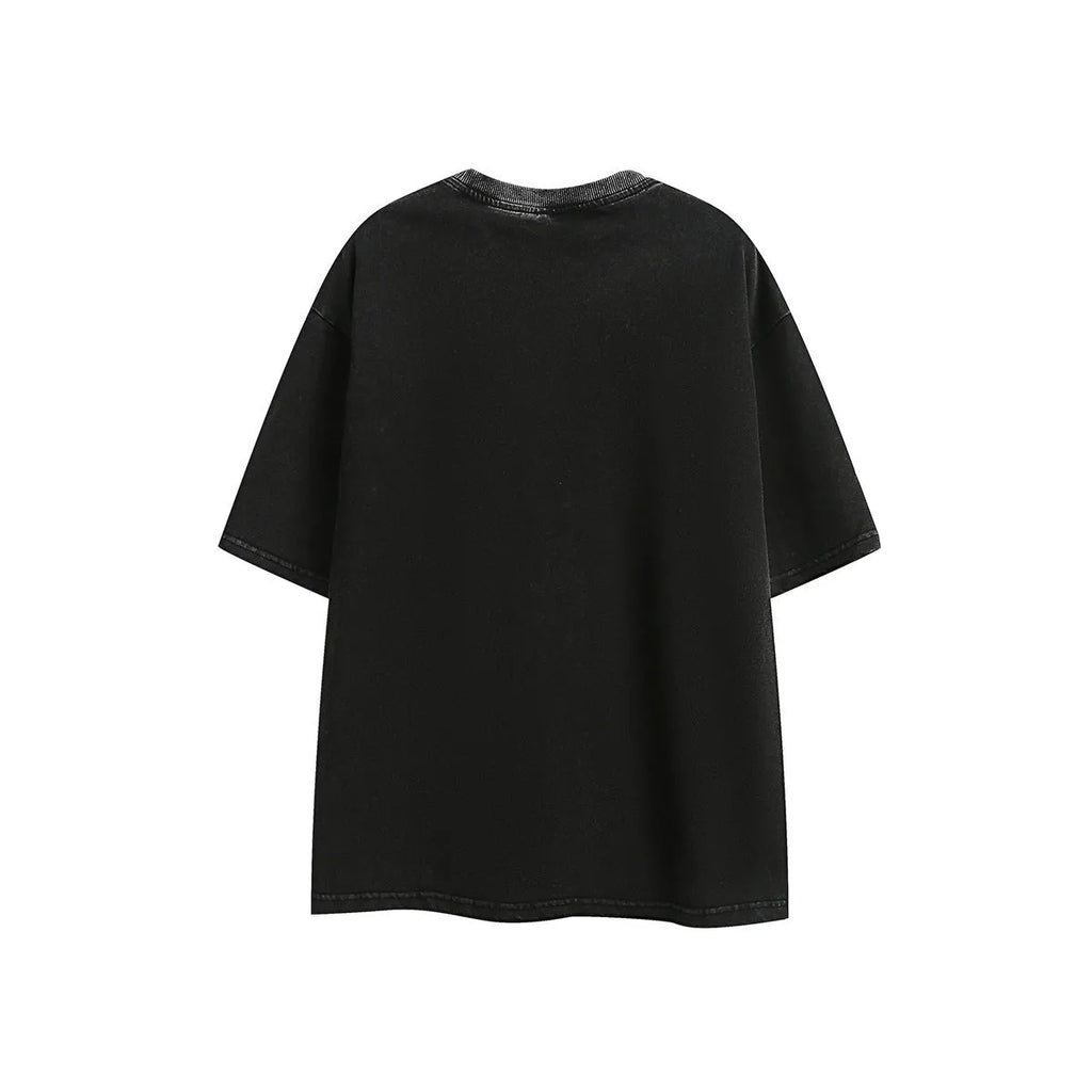 Black and purple loose-fit cotton T-shirt with embroidered design on the front.