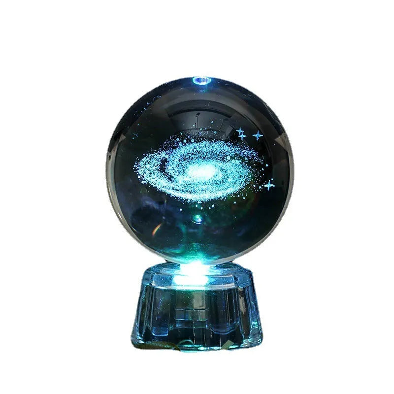 Transparent 6cm crystal ball ornament with inner carving on a fixed base, modern minimalist decor.