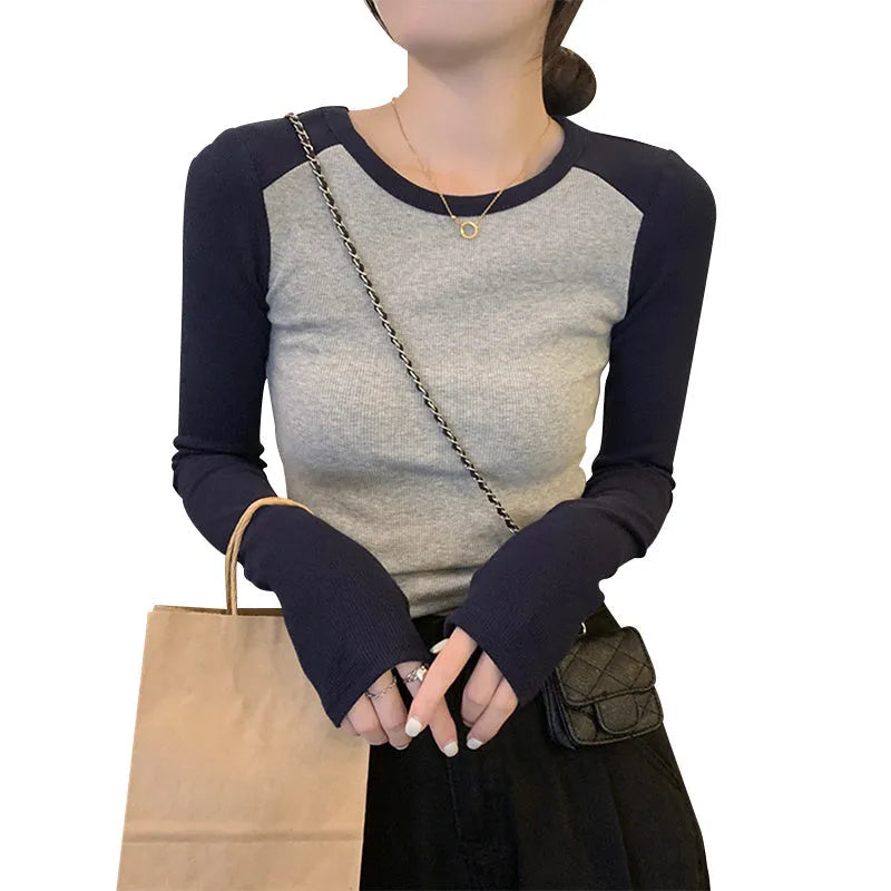 Women's oversized viscose top with long ruffled princess sleeves in dark blue.