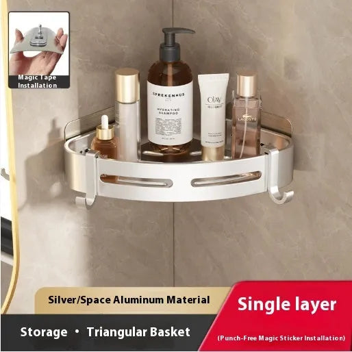 Gun Gray metal corner storage rack mounted on a bathroom wall, holding toiletries.