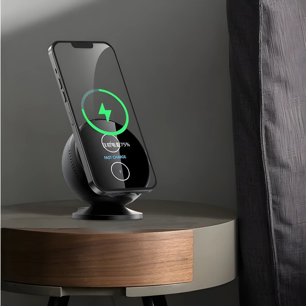 Black multifunctional wireless phone charging holder with integrated Bluetooth speaker on a desk.