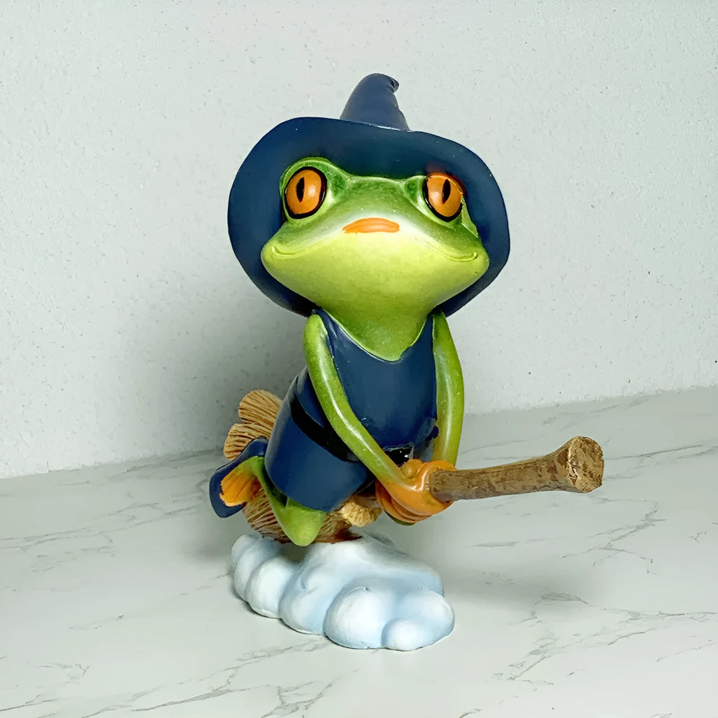 RDW123 coloured magic yoga frog resin and plastic ornament on a surface.