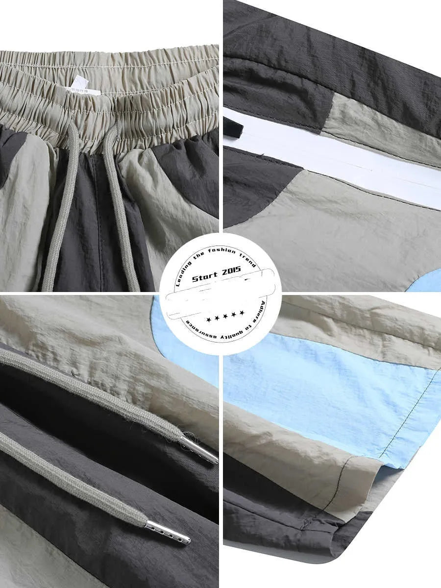 Man wearing blue patchwork loose-fit quick-drying casual sports shorts.