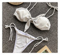 Women's three-point bikini swimsuit in purple stripe with polyester lining and backless design, sizes S M L.