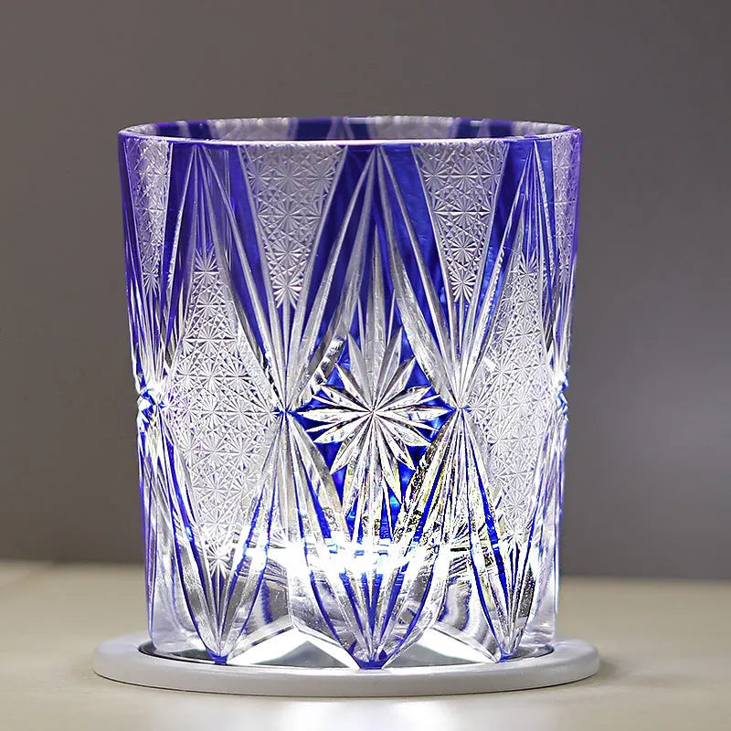 Blue hand carved crystal wine glass with 260ml capacity, retro Japanese style, on a table