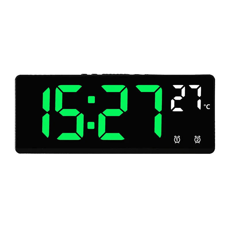 Large screen electronic LED alarm clock showing time and temperature, in a black acrylic casing.