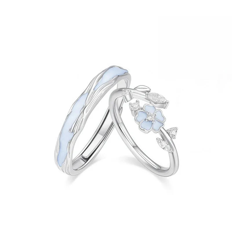 Silver sparkling camellia couple's ring with adjustable opening, floral geometric shape, electroplated finish