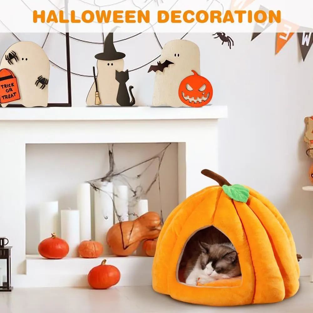 Pumpkin-shaped cat bed in blue with semi-enclosed cave design and removable interior mat