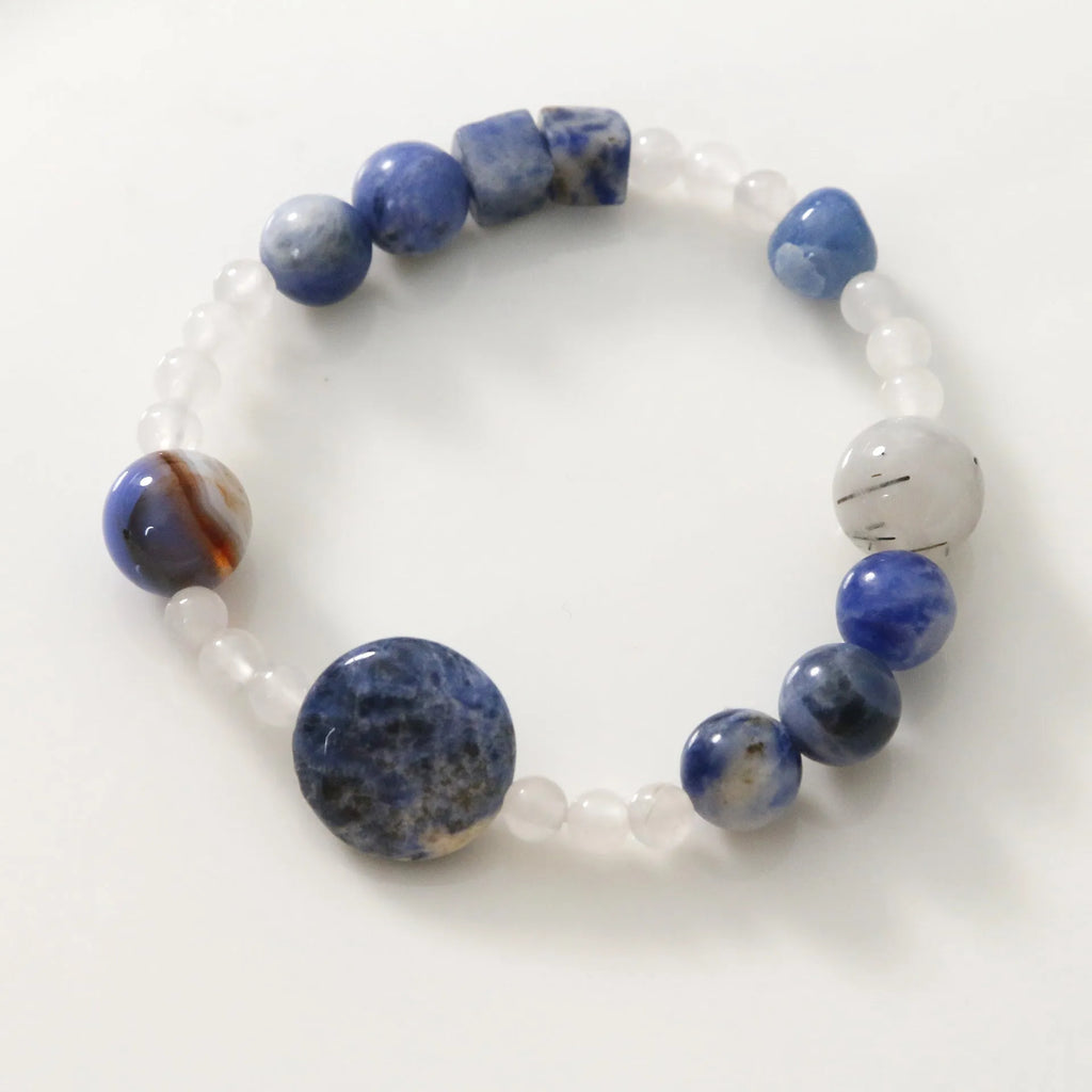 Hand-woven natural stone bracelet with blue point stone and black hair crystal agate beads