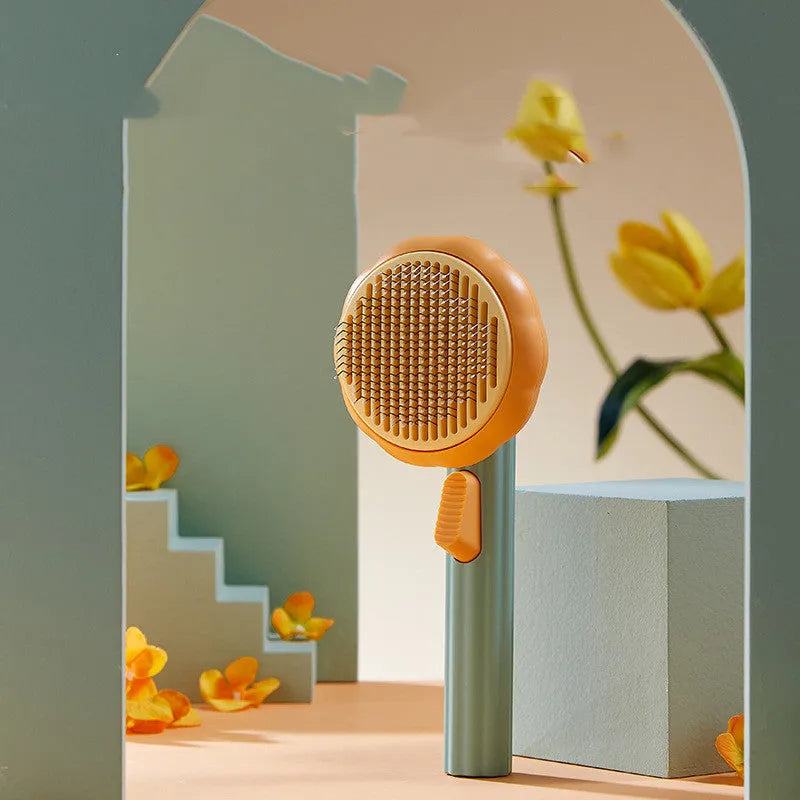 Pet grooming brush with curved steel wire teeth in white or pumpkin colour for cats and dogs