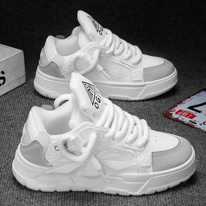 Men's white chunky sneakers with cartoon pattern, thick rubber sole, and front lace-up design on a plain background.