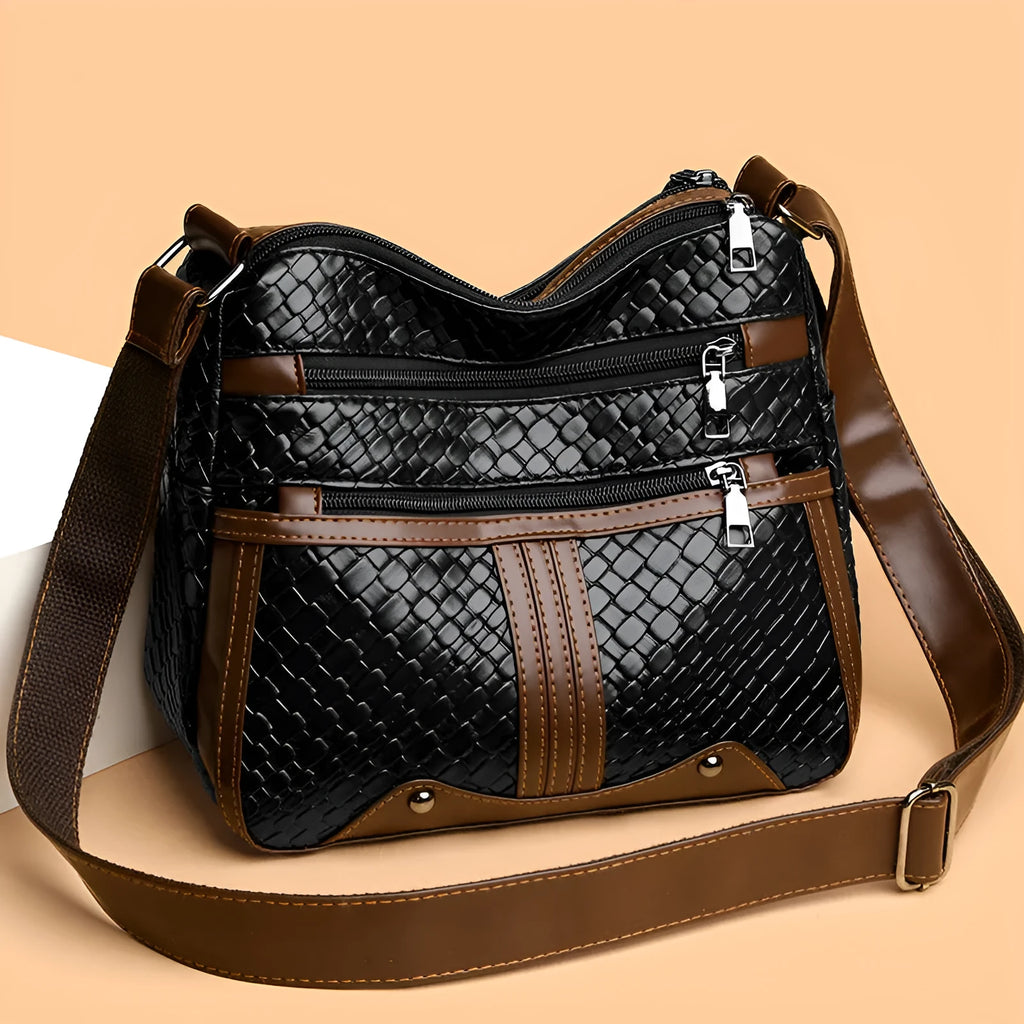 Woven texture messenger bag with multi-compartment internal organisation and single shoulder strap