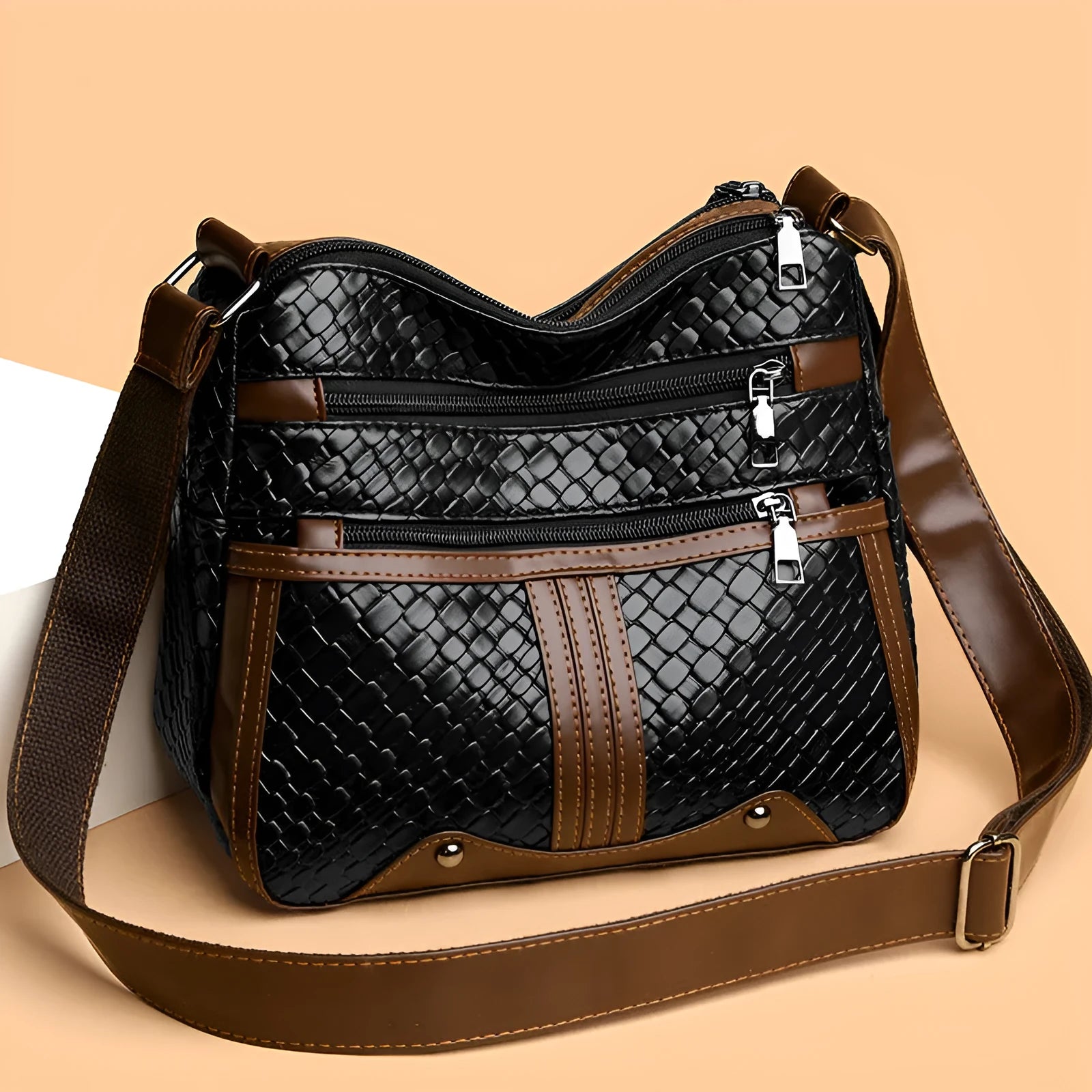 Woven texture messenger bag with multi-compartment internal organisation and single shoulder strap