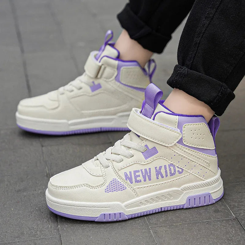 Children's coloured buckle sneakers with PU upper and rubber sole on a neutral background.