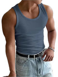 Men's tight-fit black polyester sports t-shirt on a hanger