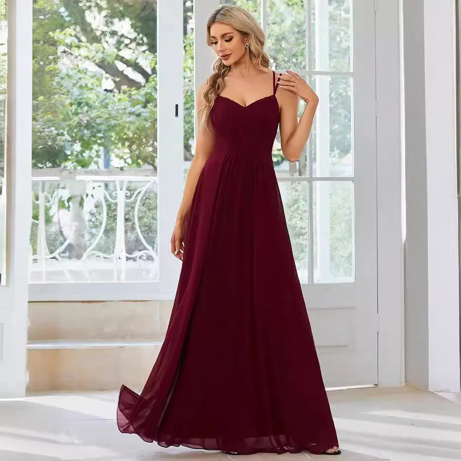 Women's sleeveless A-line long dress with pleated skirt detail in polyester fabric