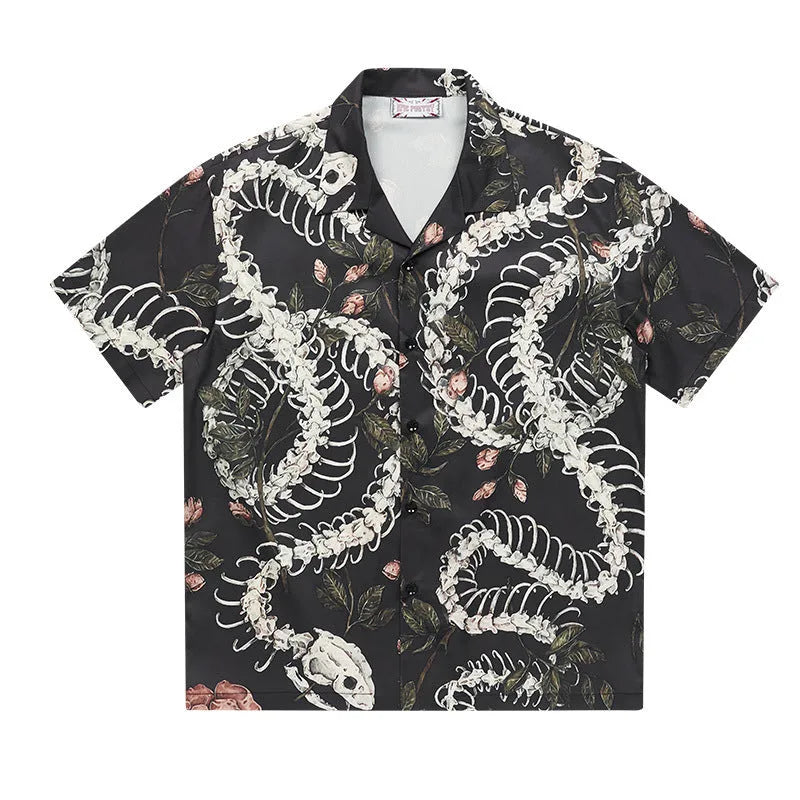 Short sleeve Cuban collar shirt with snake bone and floral pattern in a colour block style.