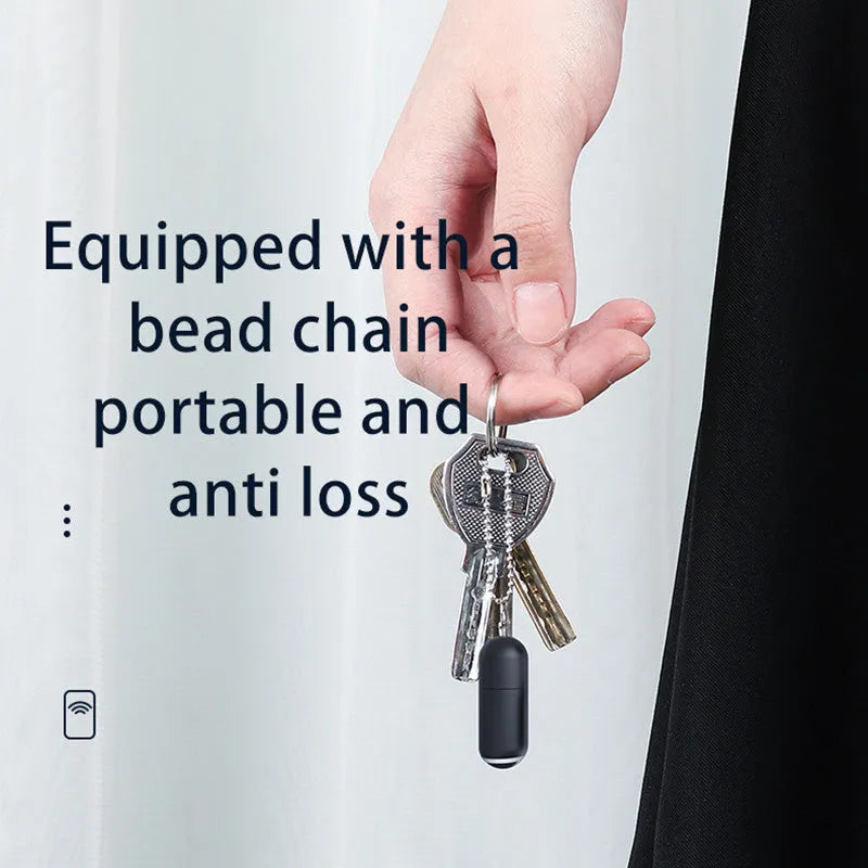 Capsule-shaped black infrared remote emitter for mobile phone charging ports