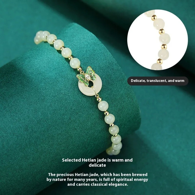 Women's Hetian jade bracelet with butterfly sterling silver inlay and cyan coloured 6mm beads