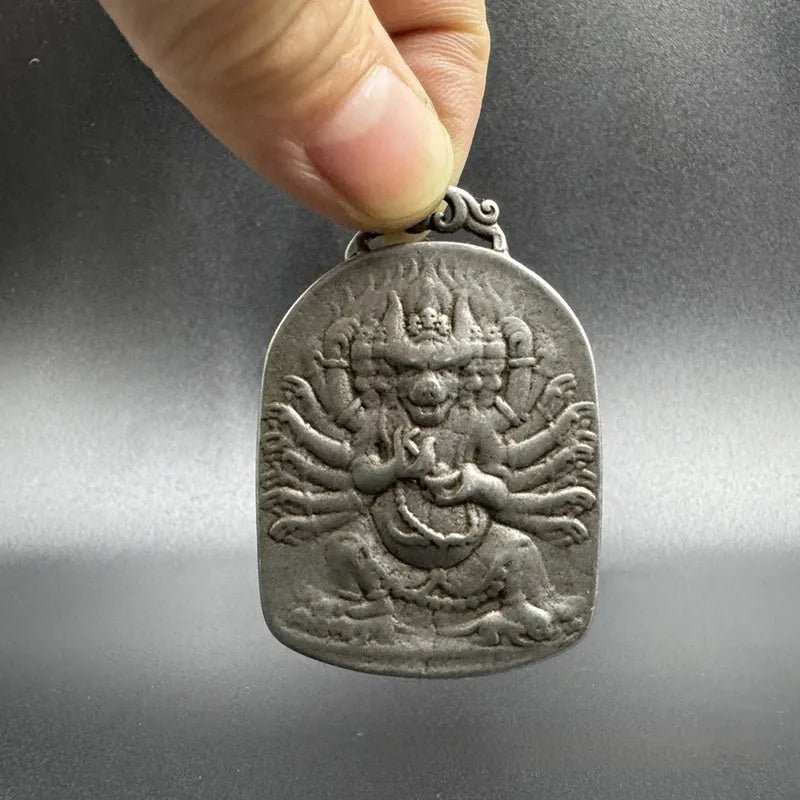 Antique Chinese-style geometric iron pendant ornament depicting Aryaacalanatha Yamantaka.