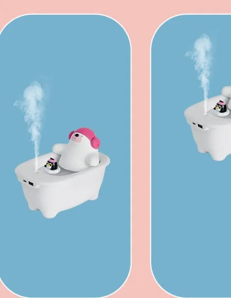 White USB-powered desktop air humidifier with large water tank on a desk.