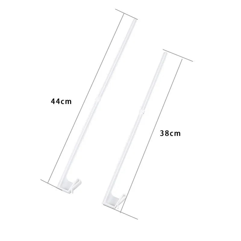 Pack of ten white plastic car window flagpole holder clips on a car window.