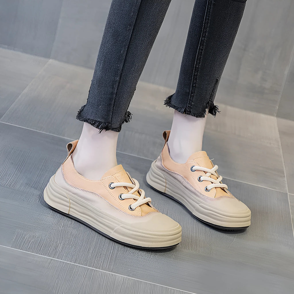 Women's leather platform sneakers in matcha green, purple and orange colours showing front lace-up design
