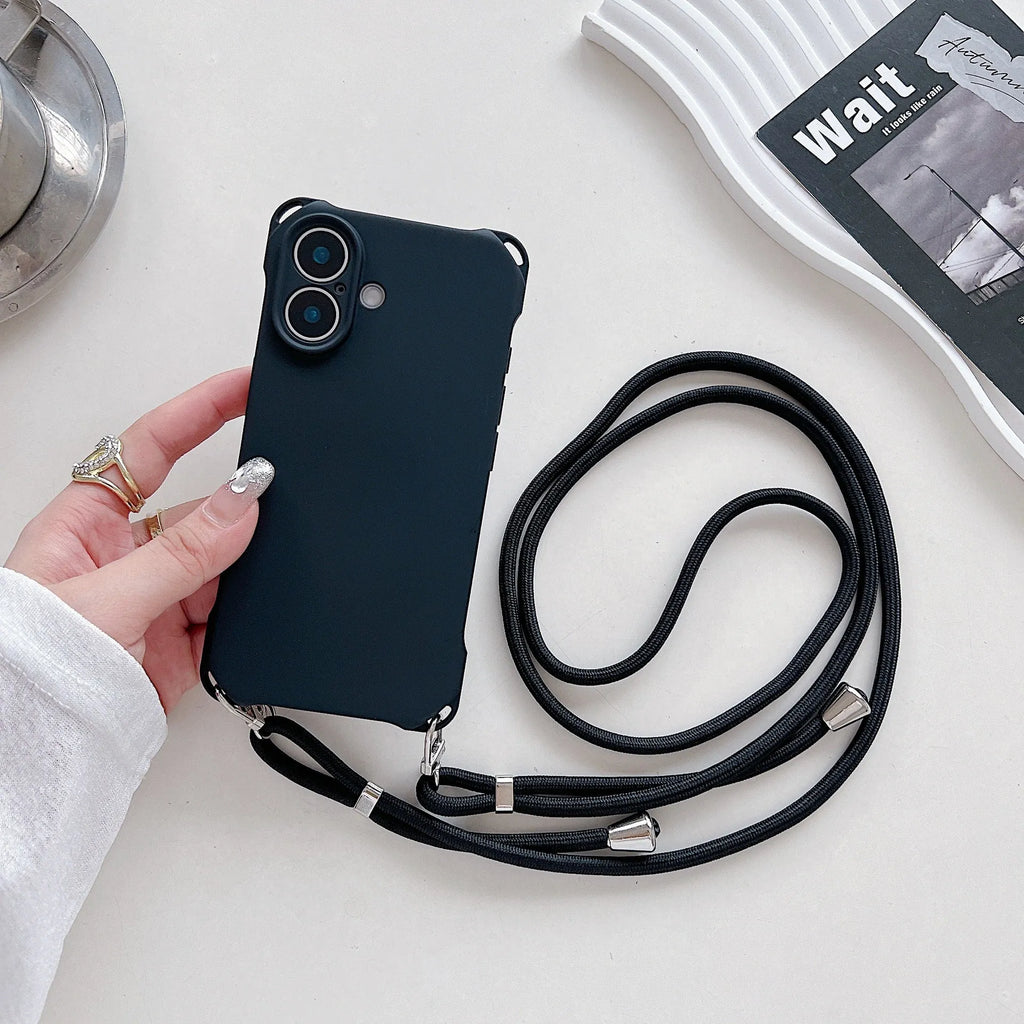 Four-corner cross lanyard liquid silicone phone case for Apple iPhone 16 Pro Max in black with detachable crossbody strap