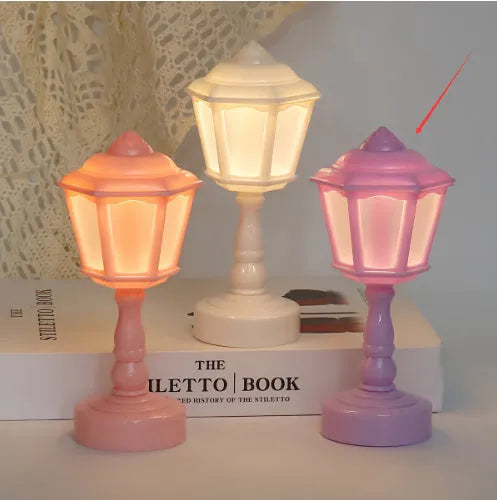 Retro pagoda-shaped night lamp in light purple colour with geometric design and built-in battery