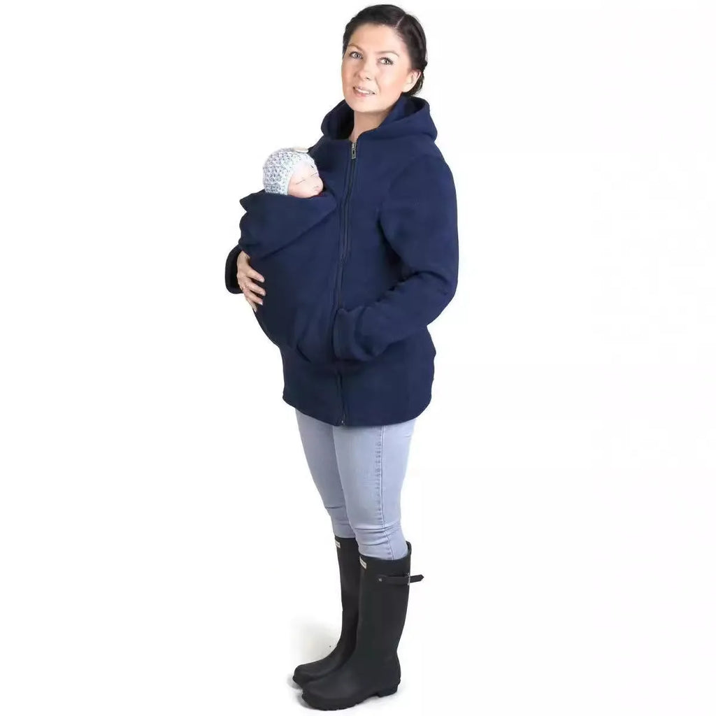 Red loose-fit polar fleece sweater for women with long sleeves, shown on a hanger.