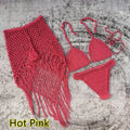 Women's handmade crochet bikini and beach skirt set in acrylic fabric.