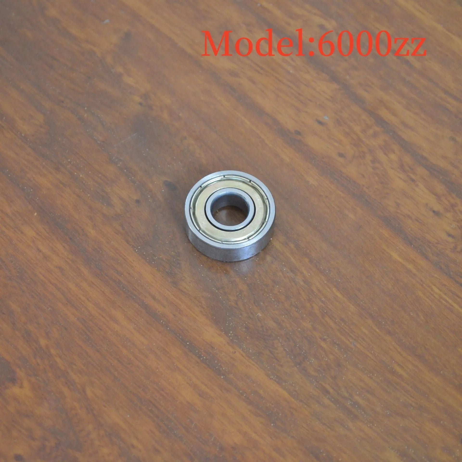 6000z carbon steel ball bearing showing 10mm inner diameter and 26mm outer diameter measurements