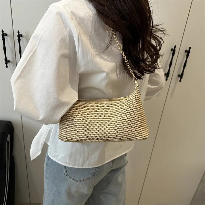 Straw woven beach shoulder tote bag in black colour with polyester lining and sandwich pockets
