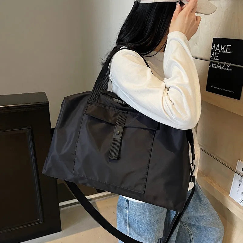One-shoulder travel backpack in Oxford cloth with 36-55 litre capacity
